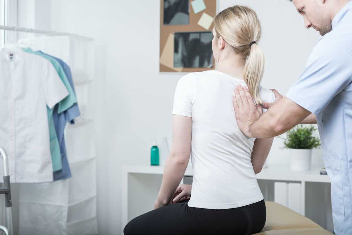 Woman with neck and shoulder pain