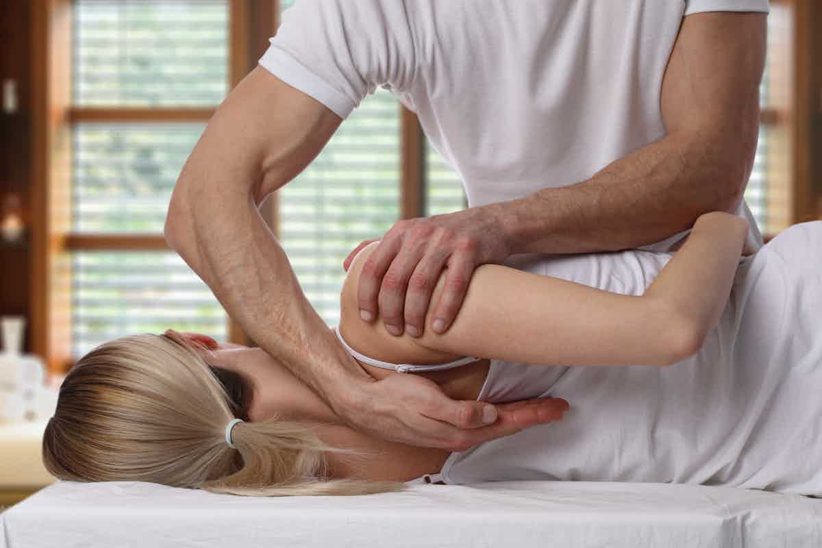 Patient visiting a chiropractor after a car accident