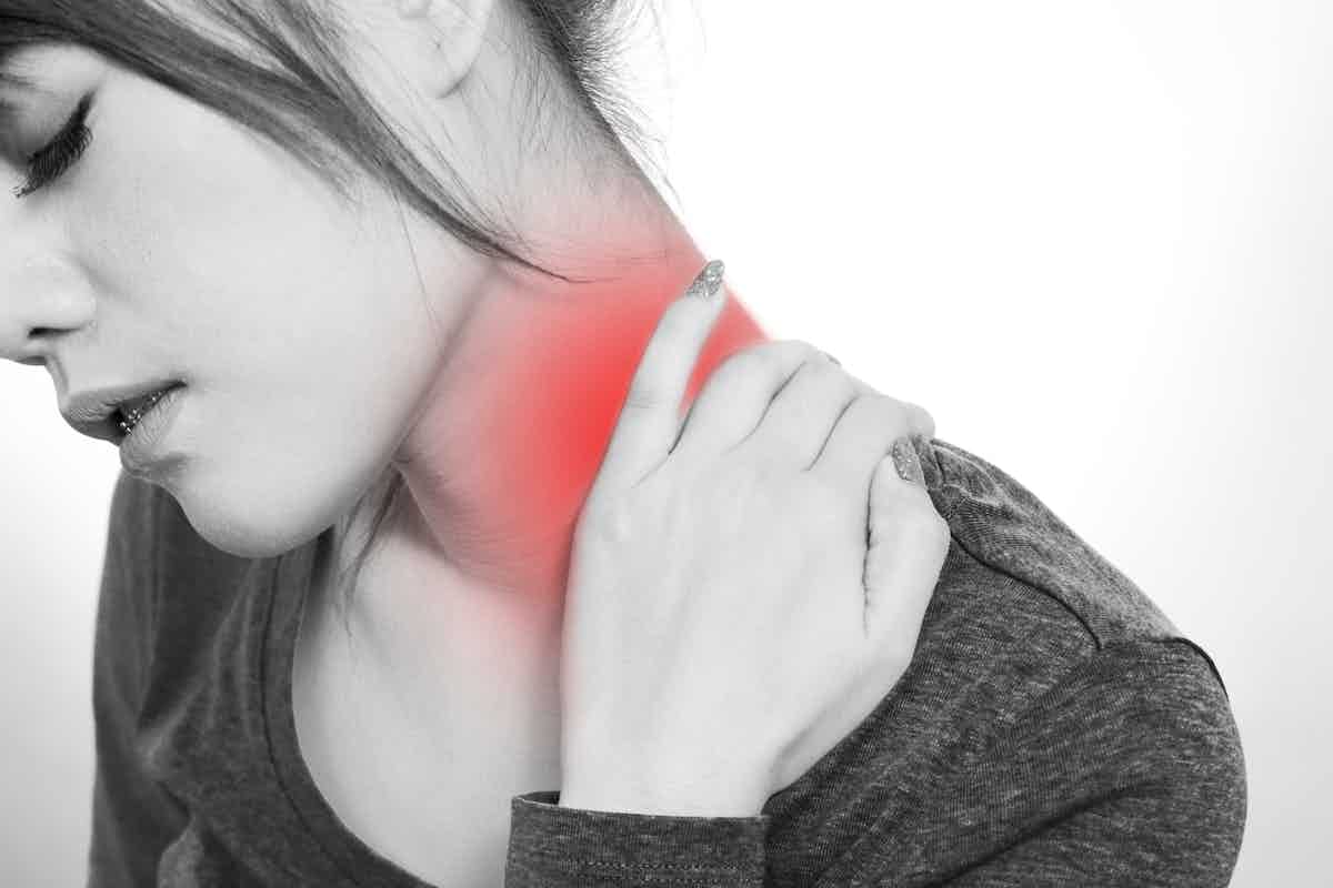 woman suffering from neck pain